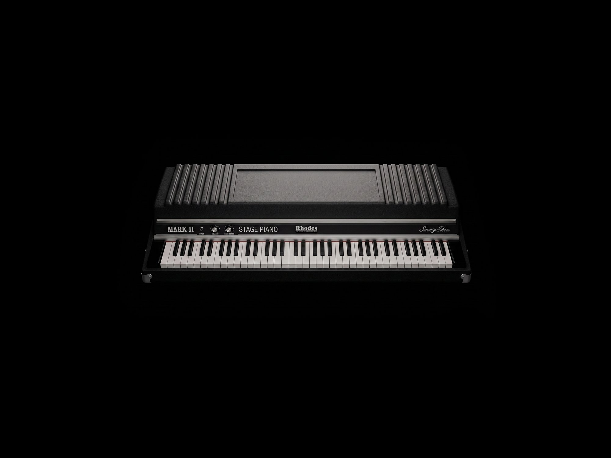 The tine piano, lit in the dark